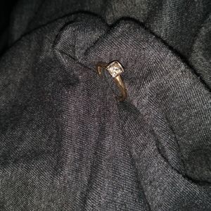 Vintage 14 karat gold with princess cut diamond